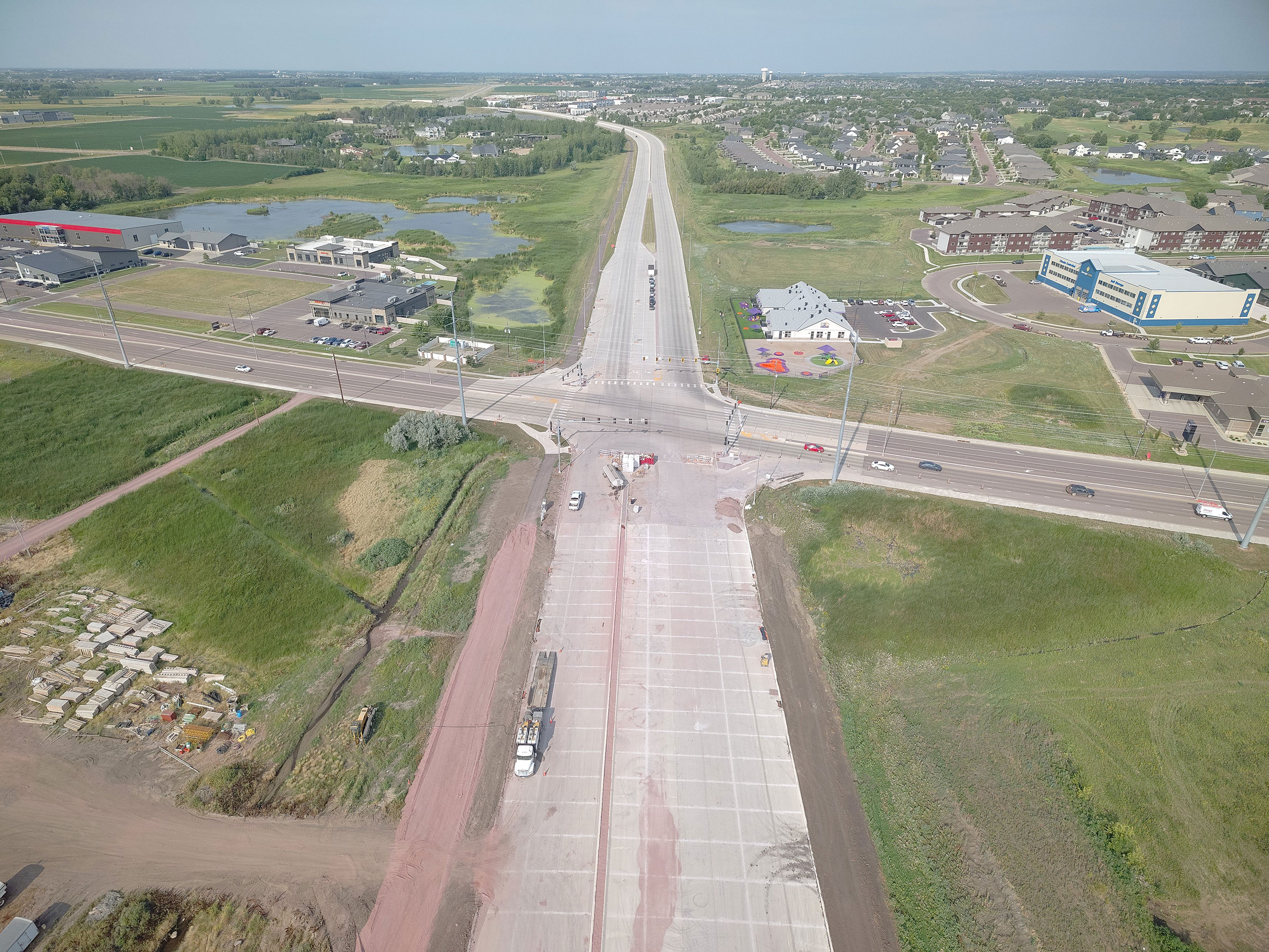 Aerial view of ongoing construction at the intersection of South Veterans Parkway and Cliff Avenue.