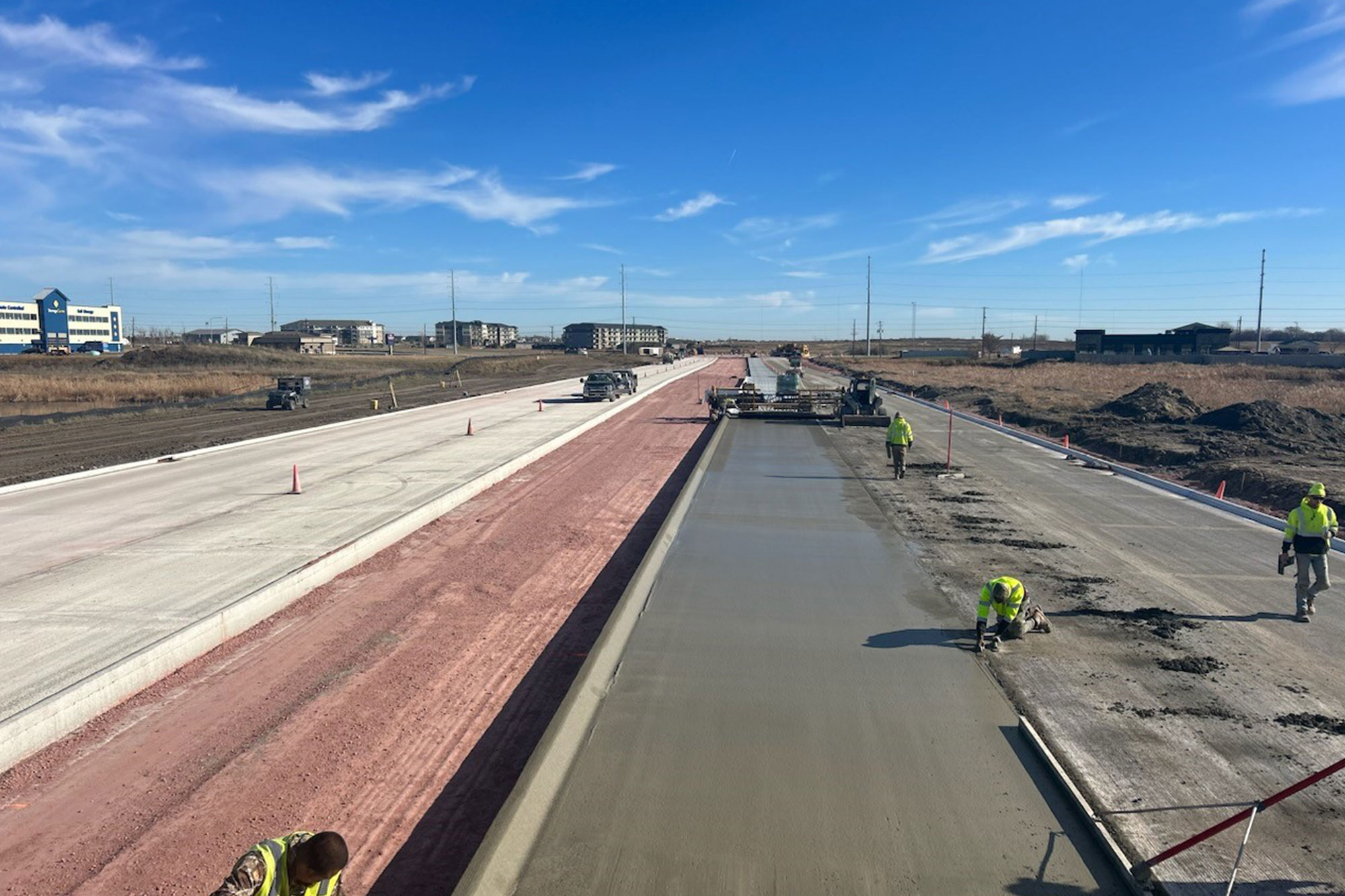 Workers finishing up Cliff Avenue construction.